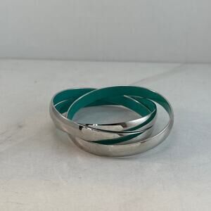 Silver toned bangle bracelet with aqua enamel interior Preowned